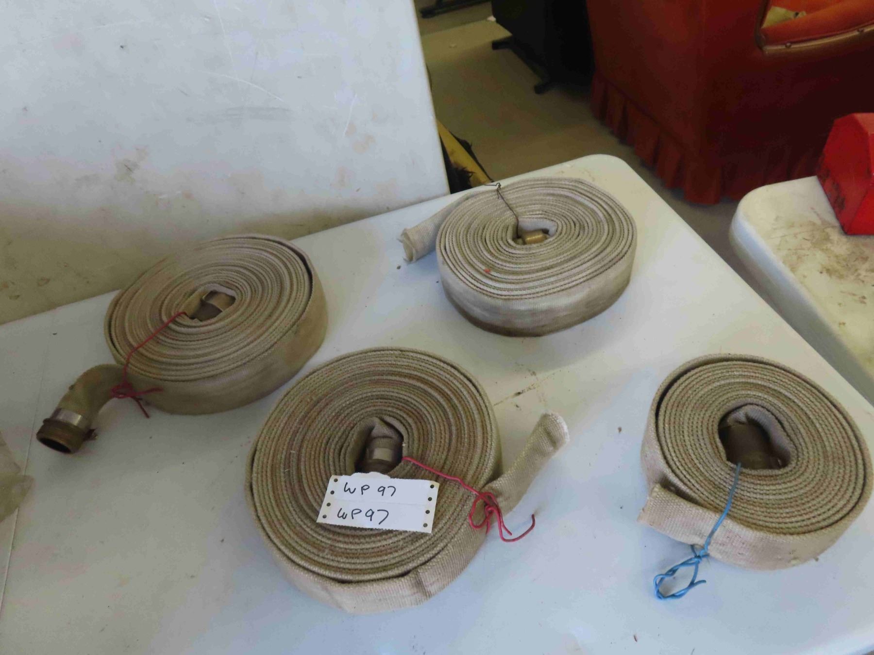 4 Rolls of Fireman Hose - McSherry Auction Service Ltd.