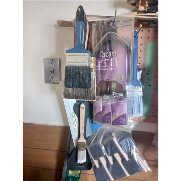 Painting Supplies on Pegs in Photo