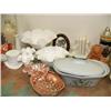 Image 3 : Whole shelf of: milk glass, Alaska stein, bookends, collector's teapots, brass, copper wear, blue de