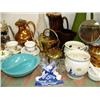 Image 5 : Whole shelf of: milk glass, Alaska stein, bookends, collector's teapots, brass, copper wear, blue de
