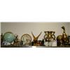 Image 1 : Top shelf consisting of: figures, shells, brass pots, cat, clock, huge brass duck, carved wood eagle