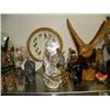 Image 3 : Top shelf consisting of: figures, shells, brass pots, cat, clock, huge brass duck, carved wood eagle