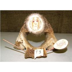 Vertebrae with ivory faced hunter (2)