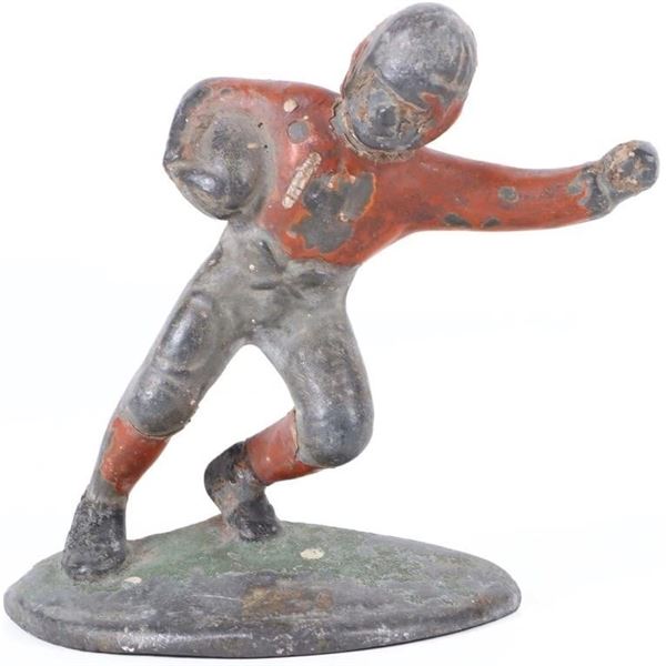 VINTAGE CAST IRON FOOTBALL PLAYER DOORSTOP