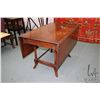Image 2 : Antique drop leaf table with drawer on each end, decorative attached carving and splayed supports, 4