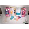 Image 1 : Vintage Barbie and Casey doll case with vintage Barbie and a selection of Barbie labeled outfits and