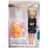Image 2 : Vintage Barbie and Casey doll case with vintage Barbie and a selection of Barbie labeled outfits and