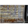 Image 2 : Premium Collection Sizan carpet, polyester, acrylic blend in shades of brown, cream, blue and yellow
