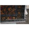 Image 2 : Premium Collection Sizan carpet, polyester, acrylic blend in shades of dark grey, cranberry and burn