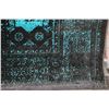 Image 2 : Premium Collection Sizan carpet, polyester, acrylic blend in shades of dark grey and teal 76" X 120"