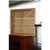 Image 2 : Modern illuminated glass and metal single door display cabinet, 64" H X 15" D and a wall mount two d