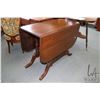 Image 1 : Mid 20th century Regency style drop leaf, walnut table with swing out table supports 29" H X 39" plu