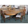 Image 1 : 48" diameter center pedestal Canadiana dining table with seven 8" insert leaves, carved paw feet, dr