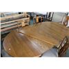 Image 2 : 48" diameter center pedestal Canadiana dining table with seven 8" insert leaves, carved paw feet, dr