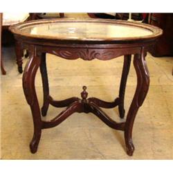 American walnut glass top coffee table with carved lady reading, circa 1940 (227)