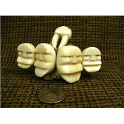 5 King Island dance masks mounted on vertebrae by Mark Seeganna $451F (2)