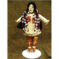 Beautiful St. Lawrence island Yupik doll with bleached seal skin, seal trim and Siberian style muklu