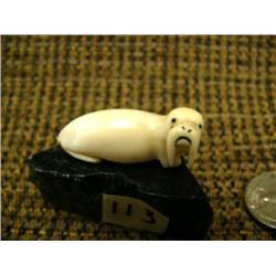 Very well done ivory walrus, circa 1960, 1.5" long mounted on soapstone - fabulous detail in face (2