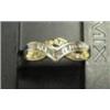 Image 1 : Lady's diamond ring 10k yellow and white gold: diamonds (round and baguette cut, approx .38 carats, 