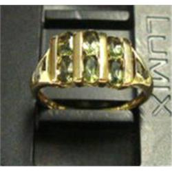 Lady's tourmaline ring 14k yellow gold: tourmaline (round and oval, faceted, approx. 1.75 carats, cl