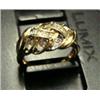 Image 1 : Lady's diamond ring 14k yellow gold: diamonds (round and baguette cut, approx. .25 carats, clarity S
