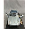 Image 2 : Maisto 1/18 Scale Porche 911 Carrera Cabriolet (1994) On Stand. Die-Cast Metal