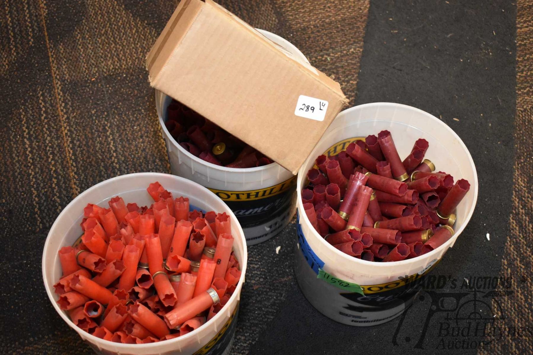 Three plastic tubs of 12 GA shot shells and a box of 20 GA high wall ...