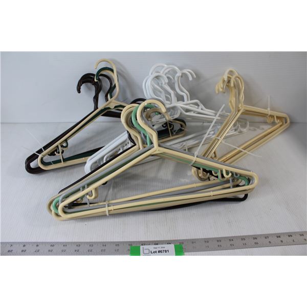 (38) Plastic Hangers