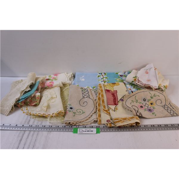 Lot: Crochet Dollies, Linen Tablecloth, Various Needlepoint Placemats