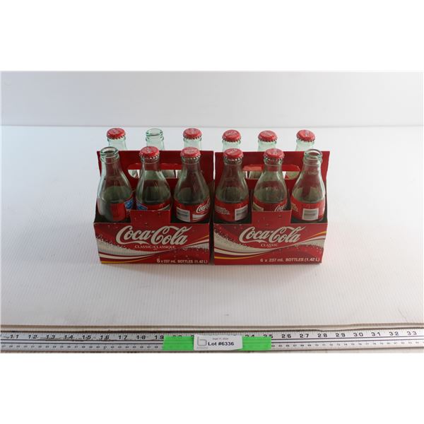 (12) Coca Cola Bottles