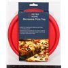 Image 1 : NEW MICROWAVE PIZZA TRAY. IDEAL FOR COOKING OR