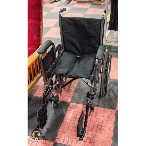 WHEEL CHAIR WITH FOOT REST