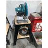Image 1 : Makita Portable Cut-Off Saw On Tool Stand with Extra Blades