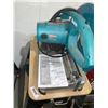 Image 2 : Makita Portable Cut-Off Saw On Tool Stand with Extra Blades
