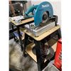 Image 6 : Makita Portable Cut-Off Saw On Tool Stand with Extra Blades