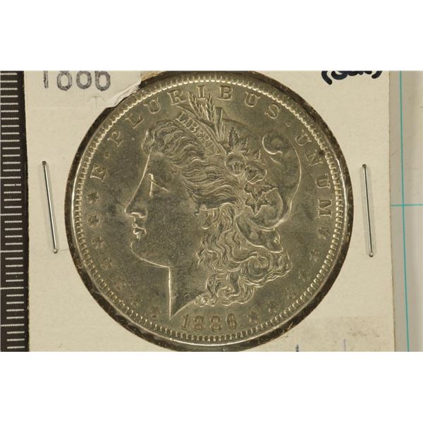 1886 MORGAN SILVER DOLLAR AU / UNC SCRATCHED ON