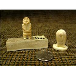 Lot of 2: scrimshawed walrus by Carson Sockpik and carved ivory Eskimo man (2)