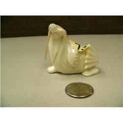 Circa 1970 ivory walrus by Moses S. with walrus whisker tusks and inset baleen eyes (2)