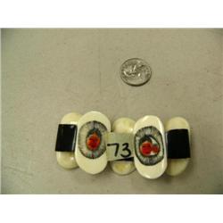 Phenomenal scrimshawed ivory and baleen bracelet from Diomede circa 1960 by Pnnesuk portraits of fam