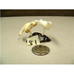 Pair of swimming ivory seals by Robert Kokuluk #397F (2)