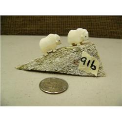 CHOICE on 4 groups of 2 ivory musk ox by Robert Kokuluk mounted on old whale bone (2)