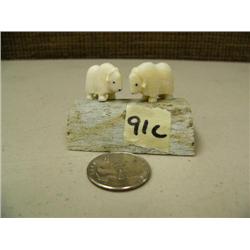 CHOICE on 4 groups of 2 ivory musk ox by Robert Kokuluk mounted on old whale bone (2)
