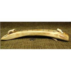 Fossilized ivory cribbage board by Romeo Katexac of Nome, AK circa 1970 with carved fossilized walru