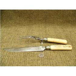 Outstanding old walrus ivory handled carving set with totem pole on each piece, blade by Ontario Kni