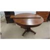 Image 1 : Oak Pedestal Table on Wheels 44'' Across with 10'' Leaf