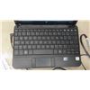 Image 2 : Compaq Mini Laptop with Power Cord and Manual 