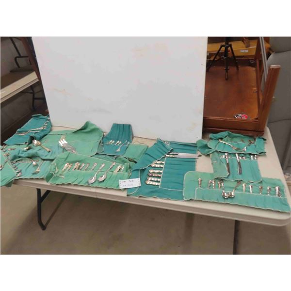Quantity of Silverware Organized in Cloth