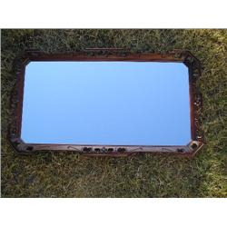 Mirror in wood frame