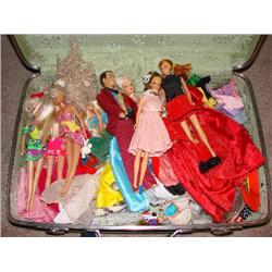Lg. suitcase filled w/Barbies