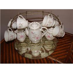 Teaset on wire display rack/mirrored base